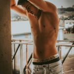 Minimalist Cross Tattoo on Ribcage