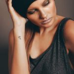 Symbol on Wrist Tattoo